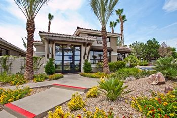 Vintage at the lakes apartment homes clubhouse and leasing office with elegant landscaping